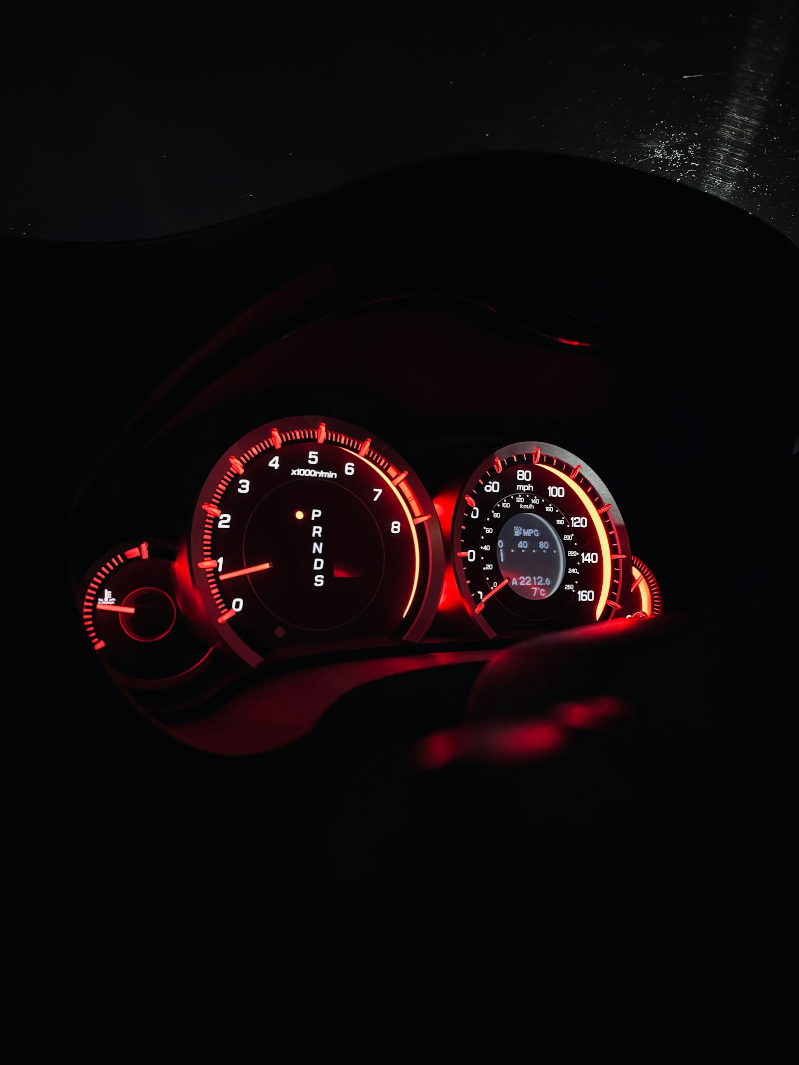 Car dashboard with warning lights illuminated