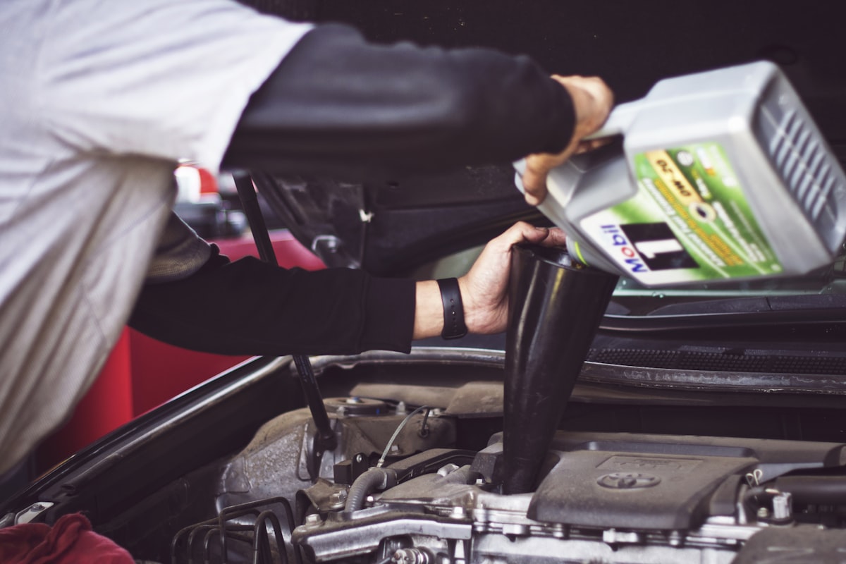 Automotive technician working on a vehicle